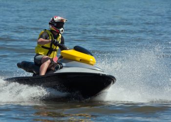 Man Riding Jet Ski Wet Bike Personal Watercraft
